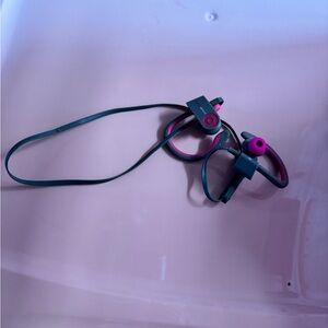 Pink and grey beats over the ears